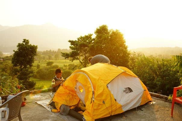 A volunteer's tent at sunrise above Ratnapur, October 2010. The team sleeps where the camp is.