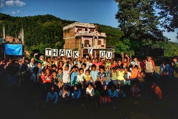 Thank you, spelled out one letter per child.